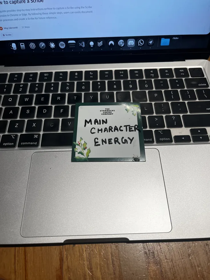 A Starbucks card reading Main Character Energy